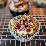 Pumpkin muffins cooling on a wire rack